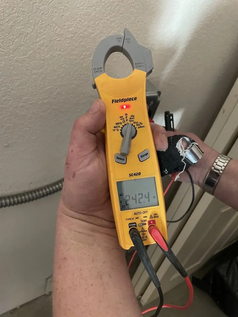 Voltage testing with clamp meter during Aluminum Wiring Replacement in Hohenwald